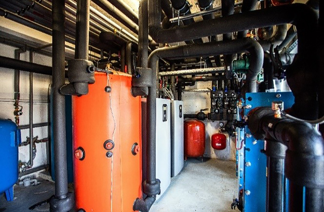 Heat exchange unit that converts geothermal energy to use for heating/cooling